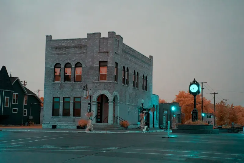 The Credible Outsider: Why the Visitor's Account of Your Town Has Always Outweighed Your Own